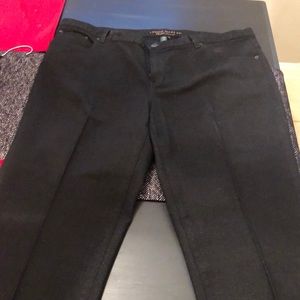 Black sparkly jeans with bling on pockets